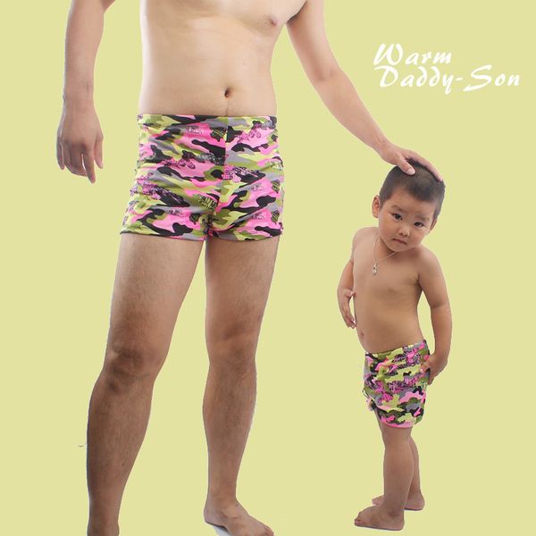 matching swim shorts dad and baby
