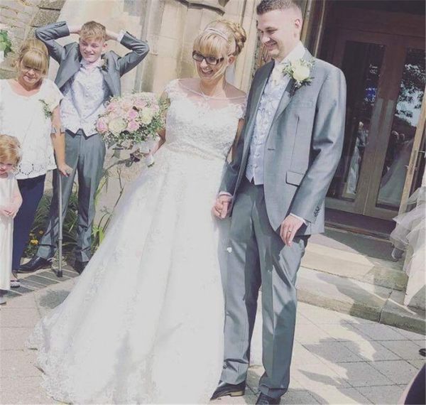 

stunning scoop neckline a-line plus size sleeveless wedding dress crystals waistline illusion back long bridal dress, White