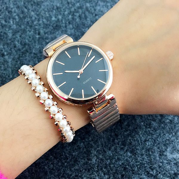 

Fashion brand Women's girl steel band quartz wrist watch GU35