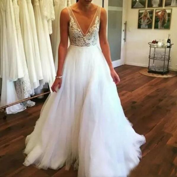 

Sexy Deep V Neck Bohemian Beach Wedding Dresses Sheer Lace Appliques Floor Length Plus Size Wedding Gowns Custom Made Boho Bridal Gowns