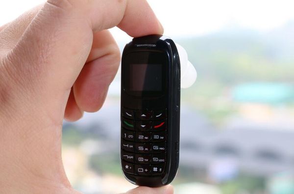 

новая мода BM70 0.66 " 300 мАч Magic voice стерео Bluetooth-гарнитура наушники карманный разблокирован студент мобильный телефон