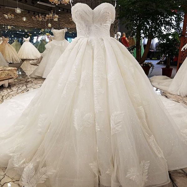 

2019 latest strapless wedding dresses tassel sweetheart neck backless lace up back beaded sequins pattern applique garden bridal gowns, White