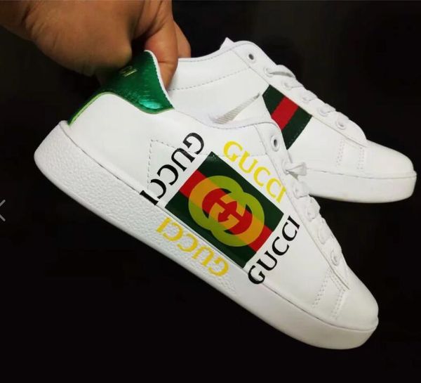 white and gold gucci shoes