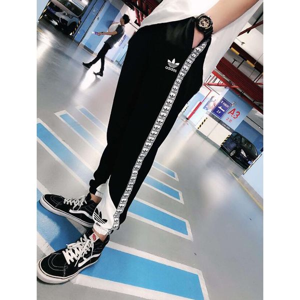 

New white black men de igner jogger fa hion ca ual flower prince men jogger tide port pant for men hipping
