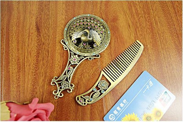

the hollow handle bronze mirror comb set e2201 handheld mirror