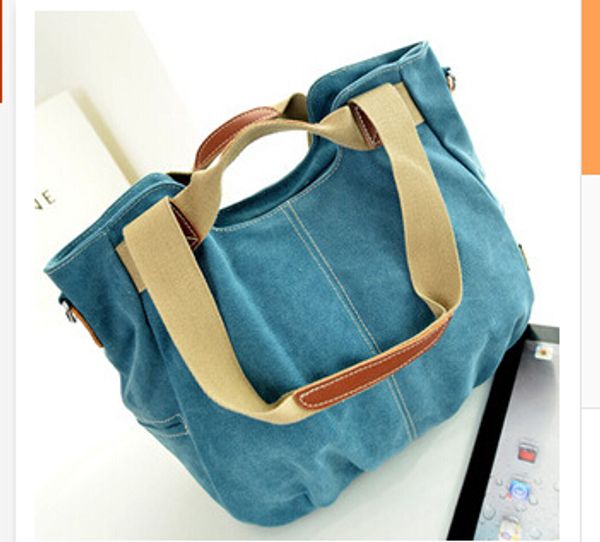 

2014 spring and summer women canvas bag with leather shoulder influx of portable multi-purpose