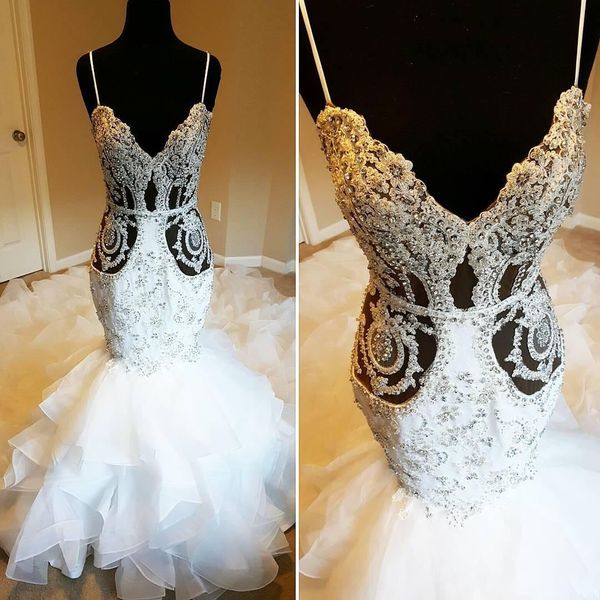 

Luxury mermaid wedding dre e paghetti trap bead cry tal chapel train backle wedding dre tiered kirt beach bridal gown