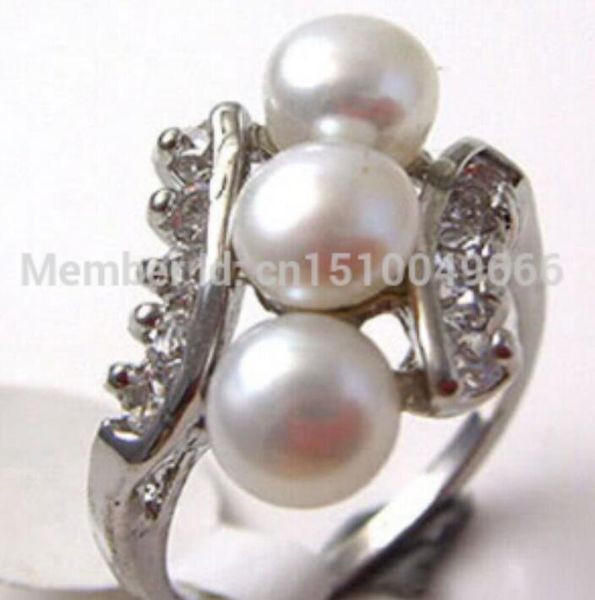 

>>>>>white pearl 3 beads silver crystal ring size: 6.7.8.9