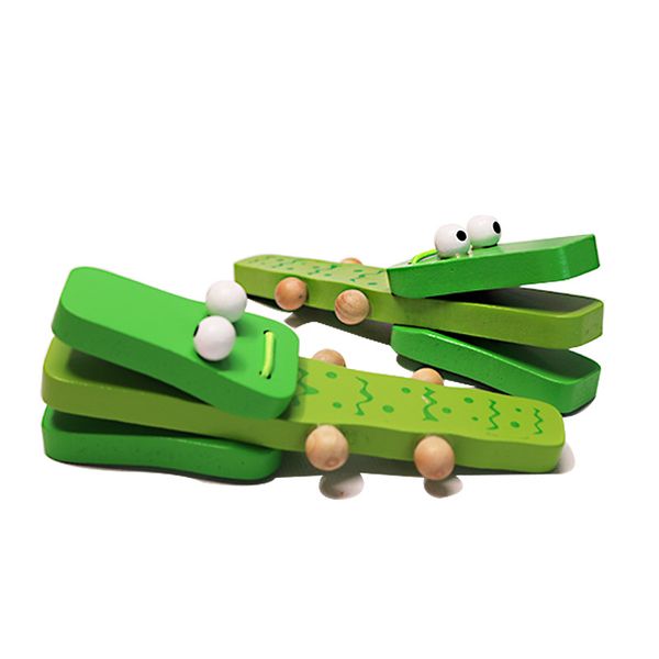 Cartone animato in legno Orff Strumenti a percussione Le nacchere con manico in coccodrillo verde bussano al giocattolo musicale per i bambini Regalo Giocattoli musicali in legno per bambini