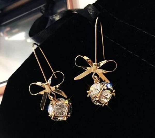 

new european and american new bow-tie zirconia crystal joker earrings personality of the fashionable people earrings long style female e, Silver