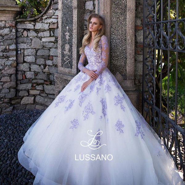 

Mode t wedding dre e with heer long leeve lavender lilac applique applique white a line bridal gown illu ion back covered button