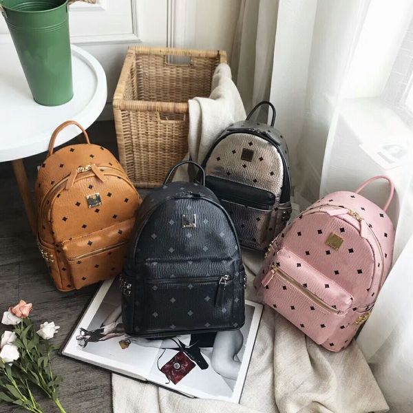 

European and american tyle new fa hion pu rivet backpack lei ure bag chool bag four color can choo e