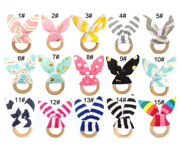 

Baby wooden teether afety wood circle teething ring with rabbit ear fabric newborn teeth practice toy training child chew teether ring