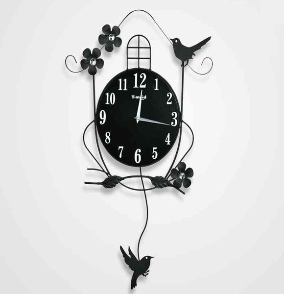 

creative arts silent swing magpies quartz clock