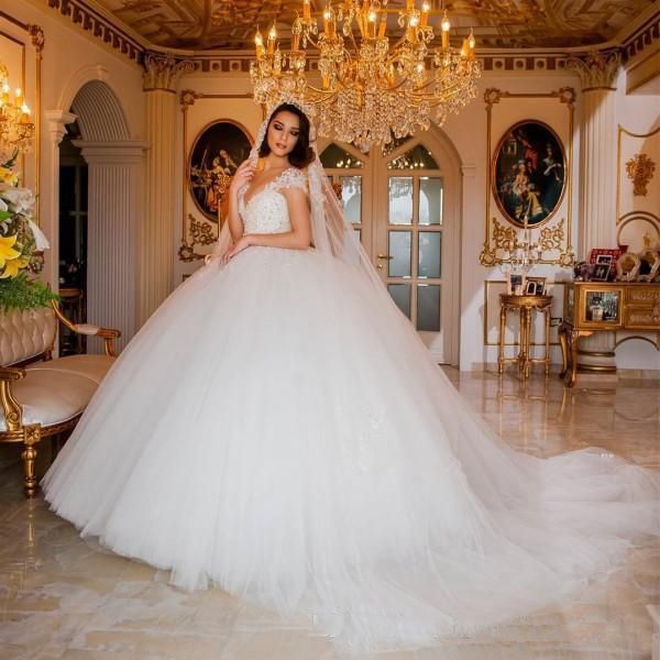 

2018 Tulle Ball Gown Wedding Dresses Princess Pearls Beads Wedding Dresses Ball Gowns Sheer Jewel Neck Lace Appliques Puffy Bridal Dresses