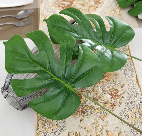 

new design 15pcs vivid plastic artificial palm tree monstera leaf greenery plants flores home wedding decoration fake flowers plant leaves