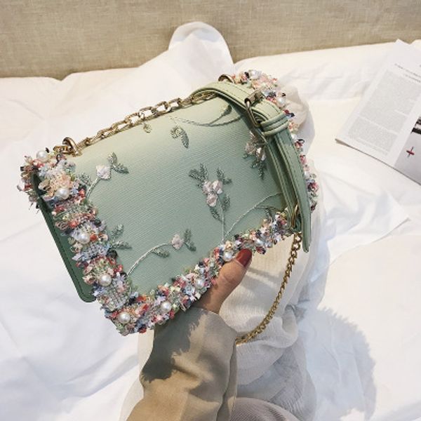 

personality design luxury embroidered flower pearl handbags women national style rivets shoulder bags crossbody bag for female