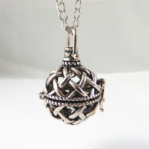 

whole salejulie wang 1pc women necklace hollow retro silver ball shape essential oil diffuser perfume oval copper locket necklace
