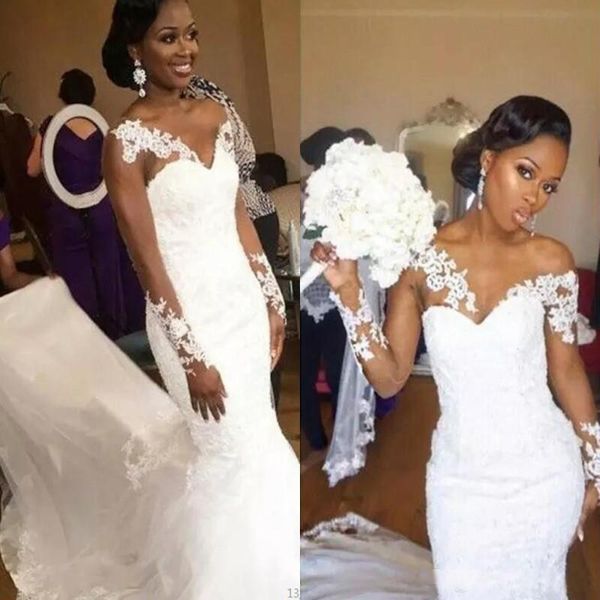 

African Mermaid Wedding Dresses Sweetheart Sheer Neckline Lace Appliques long Sleeves Wedding Gowns Cunt Train Cheap Bridal Dress Beach Wear