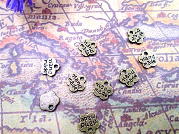 

300pcs antiqued tibetan small "hand made" charms, Bronze;silver