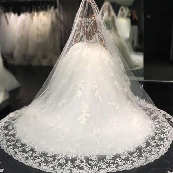 

2019 arabic ball gown wedding dresses sheer bateau neck illusion long sleeves lace appliques crystals waist tulle bridal gown with train, White