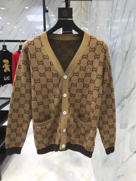 

Г-жа мужчины V-образным вырезом вязать куртка осень новое заклинание цвет жаккард письмо кнопка кардиган пальто свободные свитер бесплатная доставка