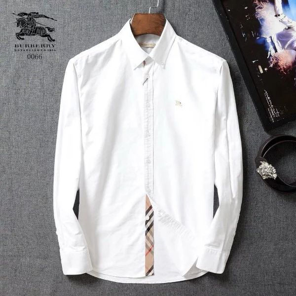 

The new luxury good brand men xiu hen pure color fa hion hirt boutique fiber long leeve button down tripe hirt m 2xl freight