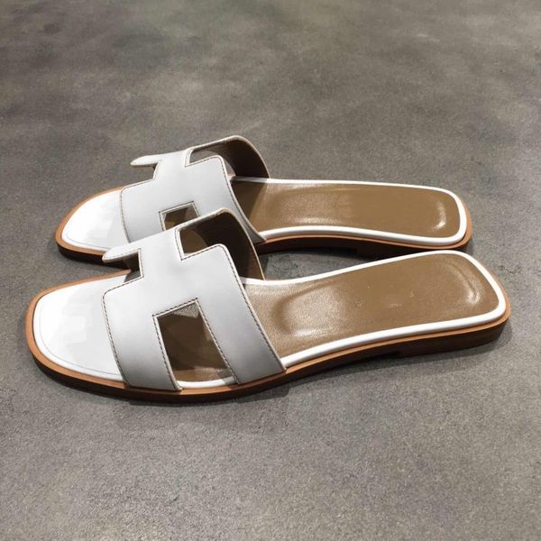 

Марка классический женщины корова кожаные тапочки лето прохладный плоский обуви