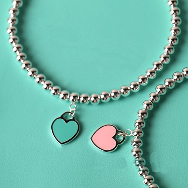 

Classic hot forever love blue pink green heart drop oil beads ladies bracelet hot round beads heart titanium steel ladies bracelet