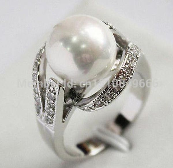 

>>>pretty 12mm white shell pearl women's ring size 6-8, Silver