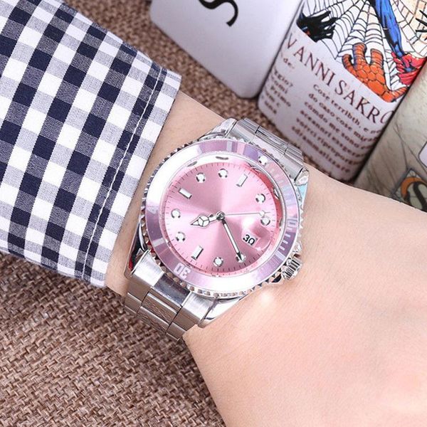 

Luxury fa hion women watche tainle teel ca ual lady pink wri twatch tag new famou brand ladie dre watch hipping