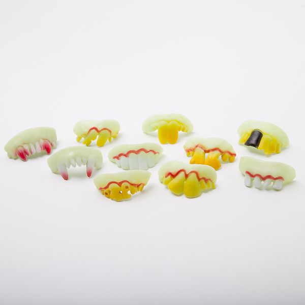

100pcs new funny horror fake zombie dentures vampire denture teeth halloween decor prop trick toy luminous classics dentures wholesale