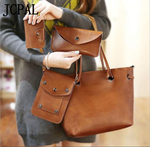 

2018 real women solid combination of new oil skin simple retro portable shoulder messenger bag mother and daughter package four
