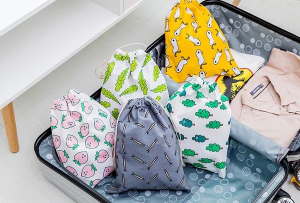 

item collection bag. cartoon. pull the rope. travel. light. storage bag. shoes bag. small items. clothing collection. small cloth bags., Blue;pink