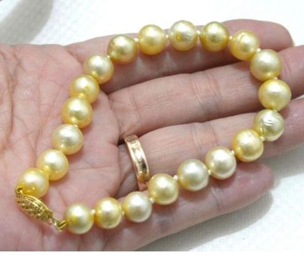 

14k yellow gold genuine 11-12mm golden south sea pearl bracelet 7.5-8, Black