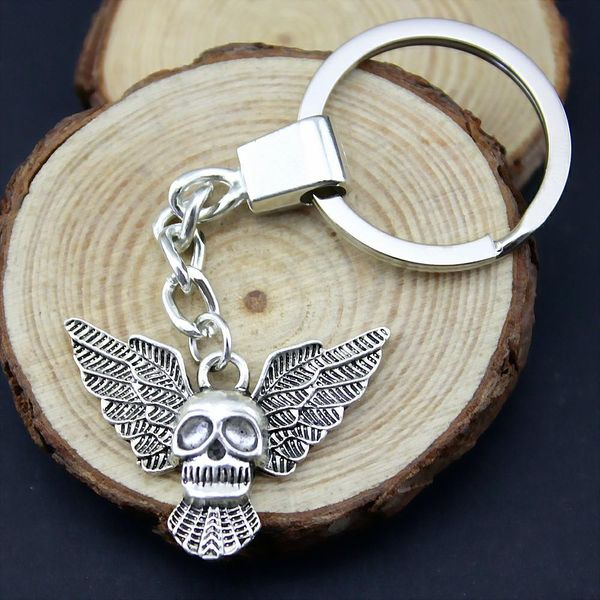 

6 pieces key chain women key rings for car keychains with charms wing skull 34x26mm, Slivery;golden