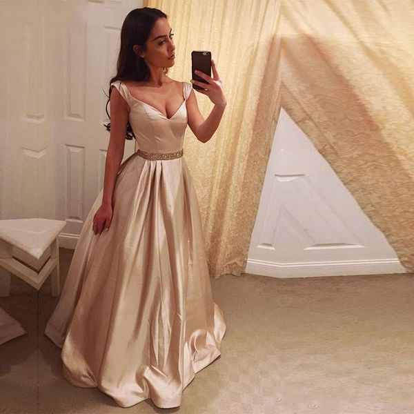 

Stunning Champagne Gold Ball Gown Prom Dresses Off Shoulder Beading Sash Satin Floor Length Backless Evening Dresses Long Graduation Dresses