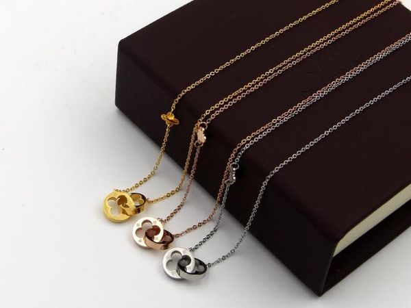 

Korean style hollow double ring clover short necklace Korean style wild titanium double lock clover clavicle necklace