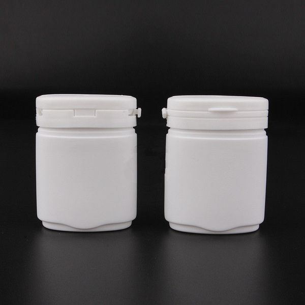 Bottiglie di gomma da masticare di plastica bianca da 80 ml con tappo a strappo Barattolo in PP di forma ovale da 80 ml per capsule/confezioni di pillole F1277