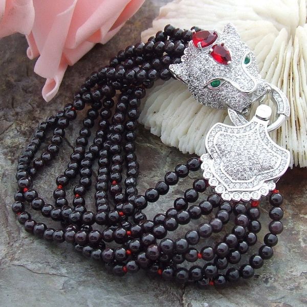 

8" 7 rows garnet bracelet cz clasp, Black