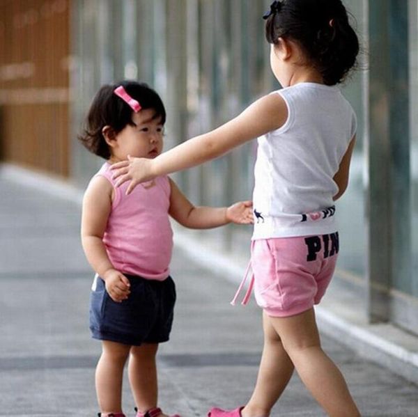 

оптовая девочка дизайнер одежды костюм розовый письмо рукавов топы + шорты мода дети костюмы спорт открытый дети дизайнер одежды девочек, White