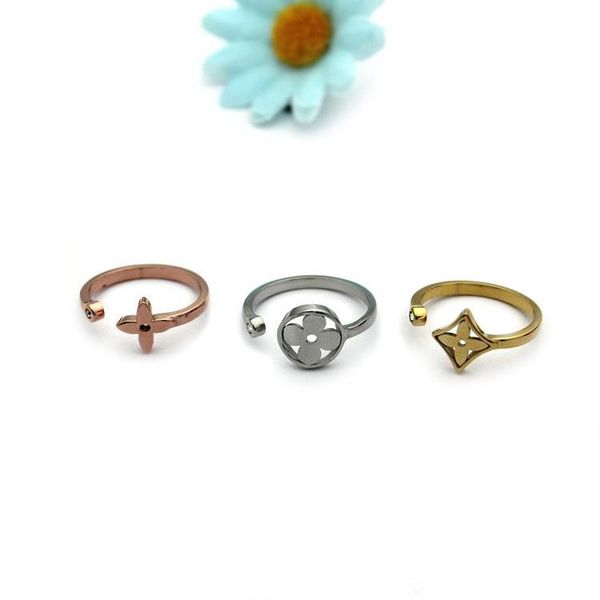 

Fashion Brand Design Rings 316L Titanium Steel Hollow Flower Three-tone Three-piece Ring 18K Gold Opening Rings Women's Rings