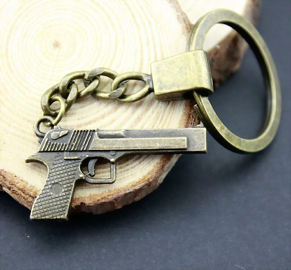 

6 шт. брелок женщины брелки мода брелки для мужчин пистолет 45x20mm, Slivery;golden