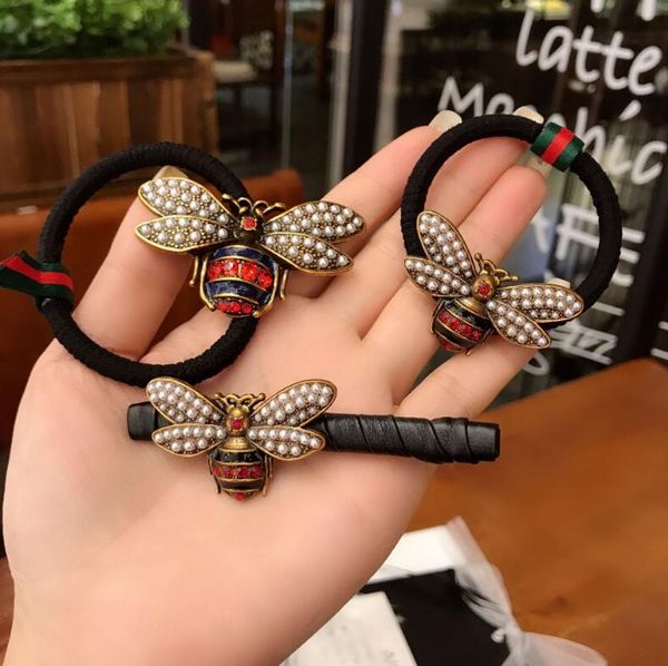 

korean version of the new headdress europe and the united states retro alloy drop oil bee imitation pearl hair rope rubber band clip hairpin, Pink