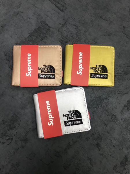 

New designer Tote wallet 18SS Metallic wallet Bag men Women Bags Designer Coin purse Clutch Bags