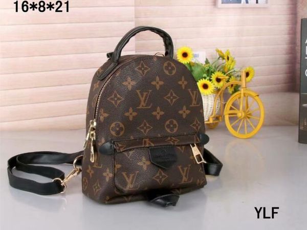 

Free shipping! orignal real Genuine leather fashionback pack shoulder bag handbag presbyopic mini package messenger bag mobile phonen purse