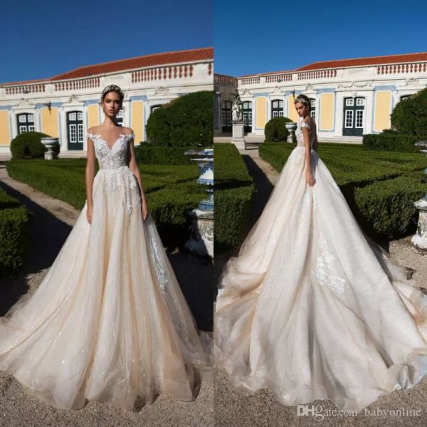 

2019 new champagne wedding dresses elegant off shoulder lace appliques puffy tulle a line bridal gowns backless with buttons, White