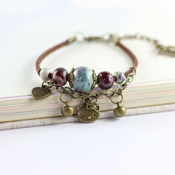 

12 pieces/lot leaf charm leather bracelets women ceramic beads bells link chain cuff bangle bohemian ladies jewelry accessories, White