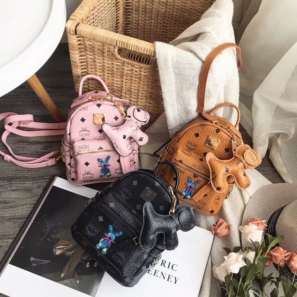 

новая мода женщины и дети Письмо печати рюкзак досуг заклепки рюкзак сумка три цв