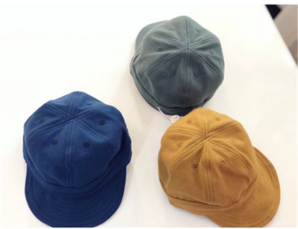 short brim fitted hat